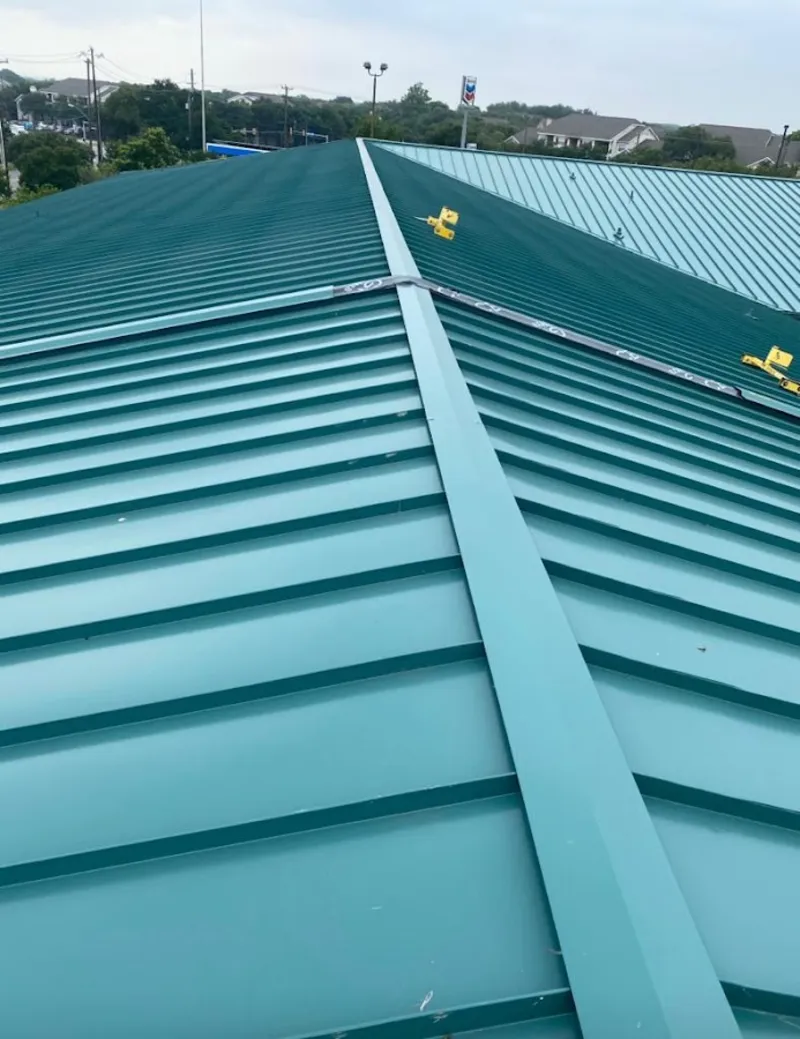 Green commercial metal roof ridge and valley for Metal Roof Repair in Las Flores